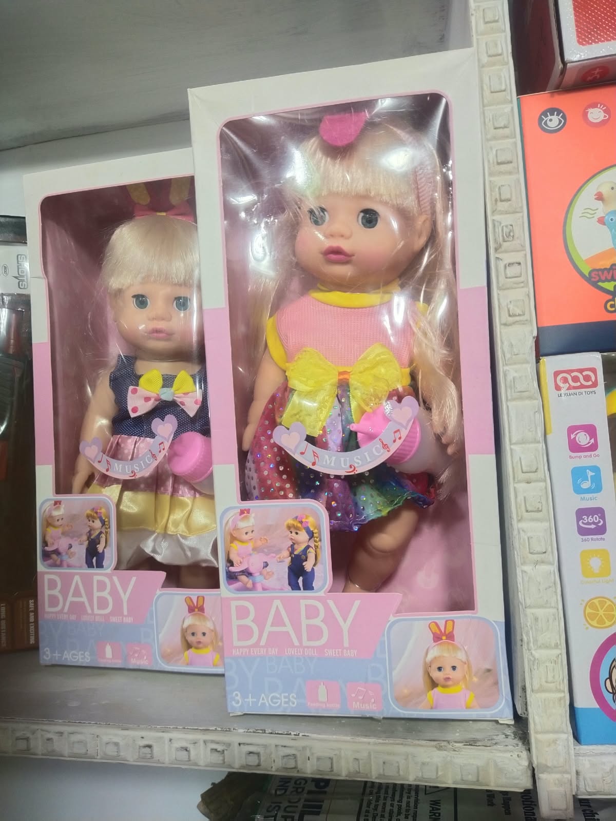 Musical Baby Doll with Feeding Bottle & Sound Features (3+ Ages) — image 1